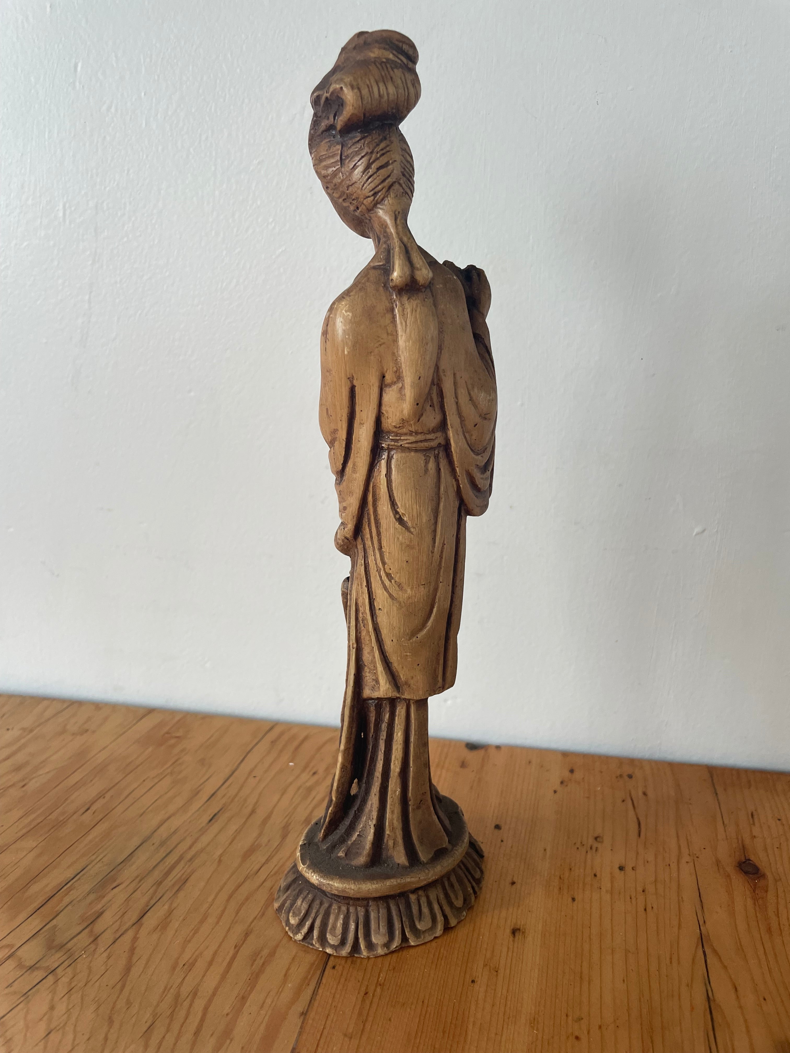 Woman With Jug Fingurine.
