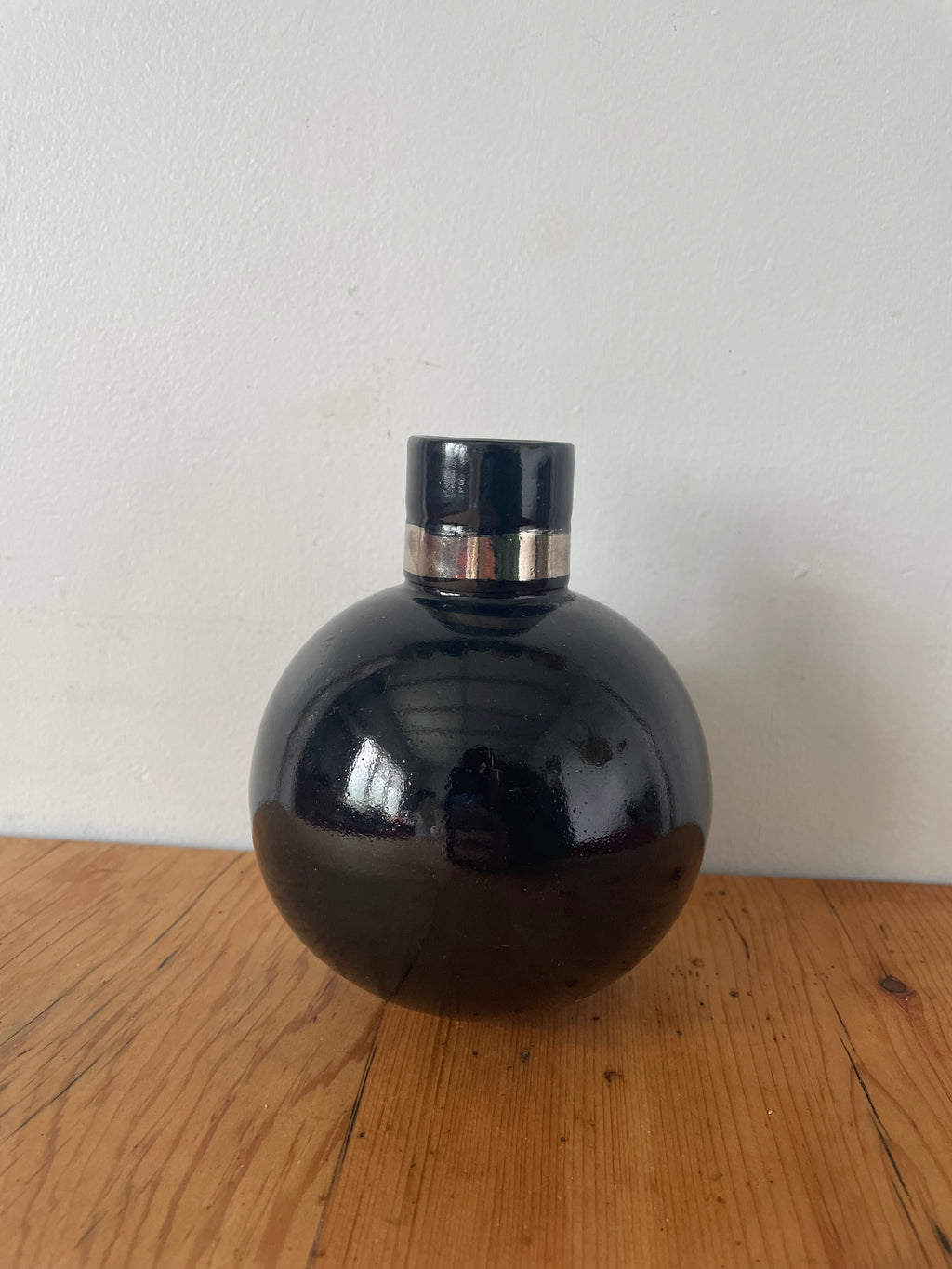 Black And Silver Pottery Vessel