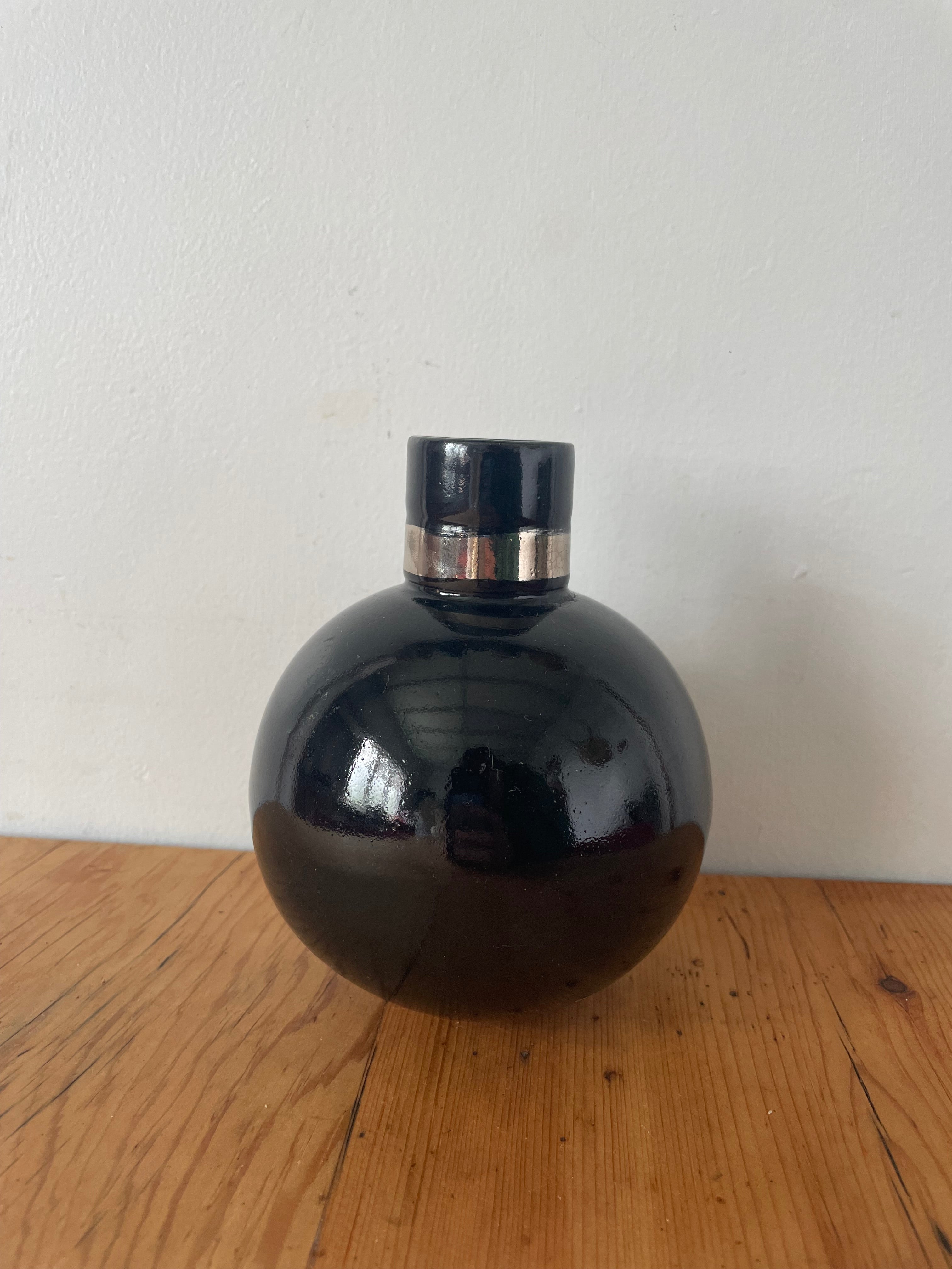 Black And Silver Pottery Vessel