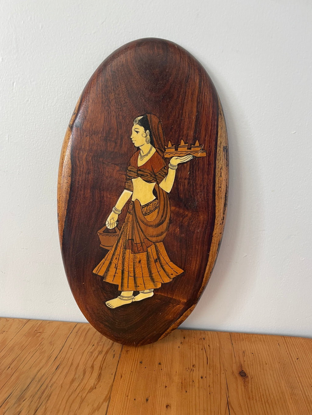 Wooden Plaque Of A Woman In A Sari