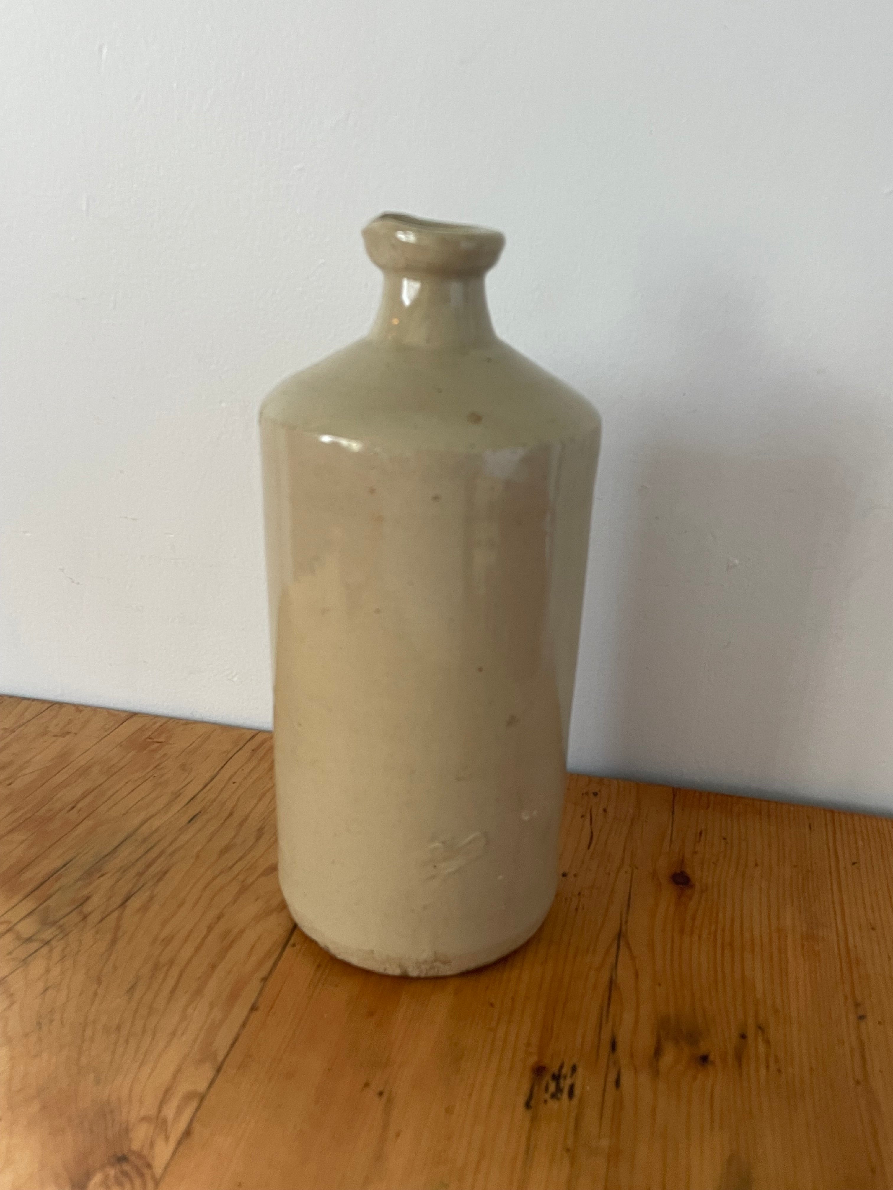 Antique Stoneware Lipped Bottle