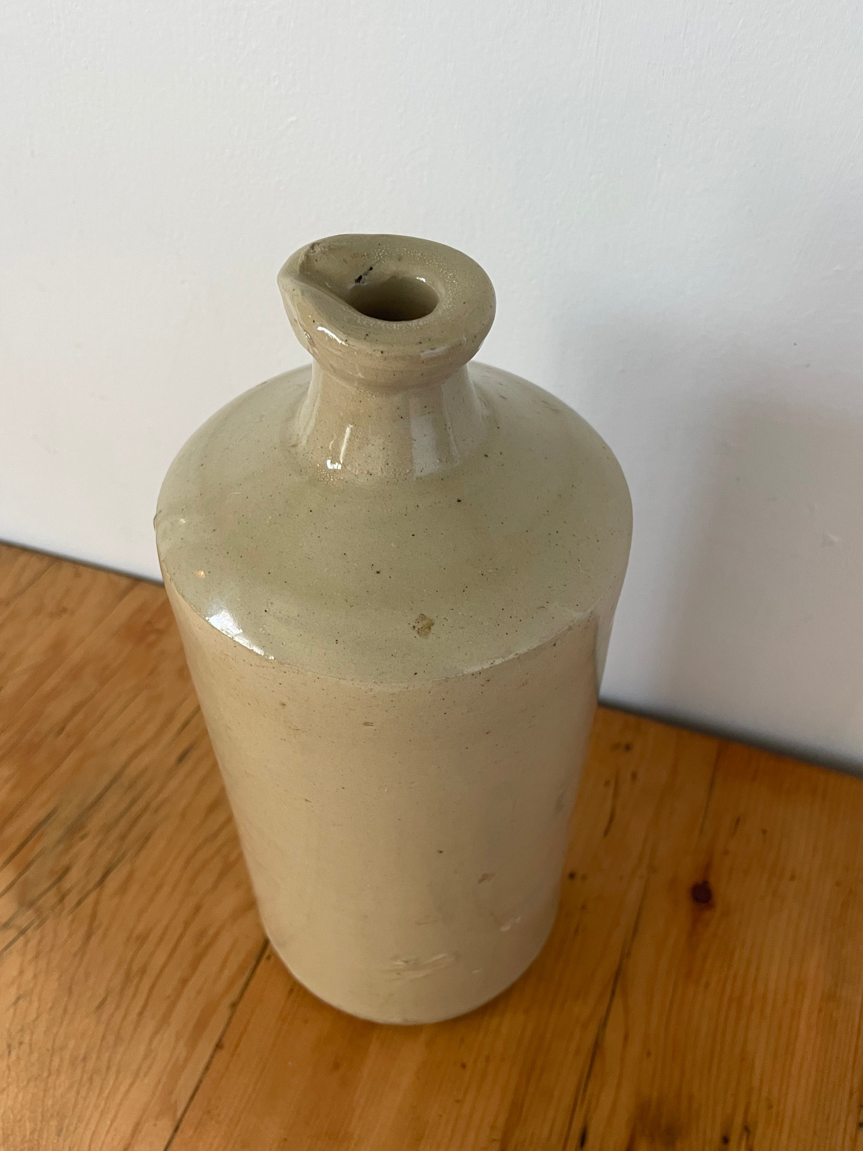 Antique Stoneware Lipped Bottle