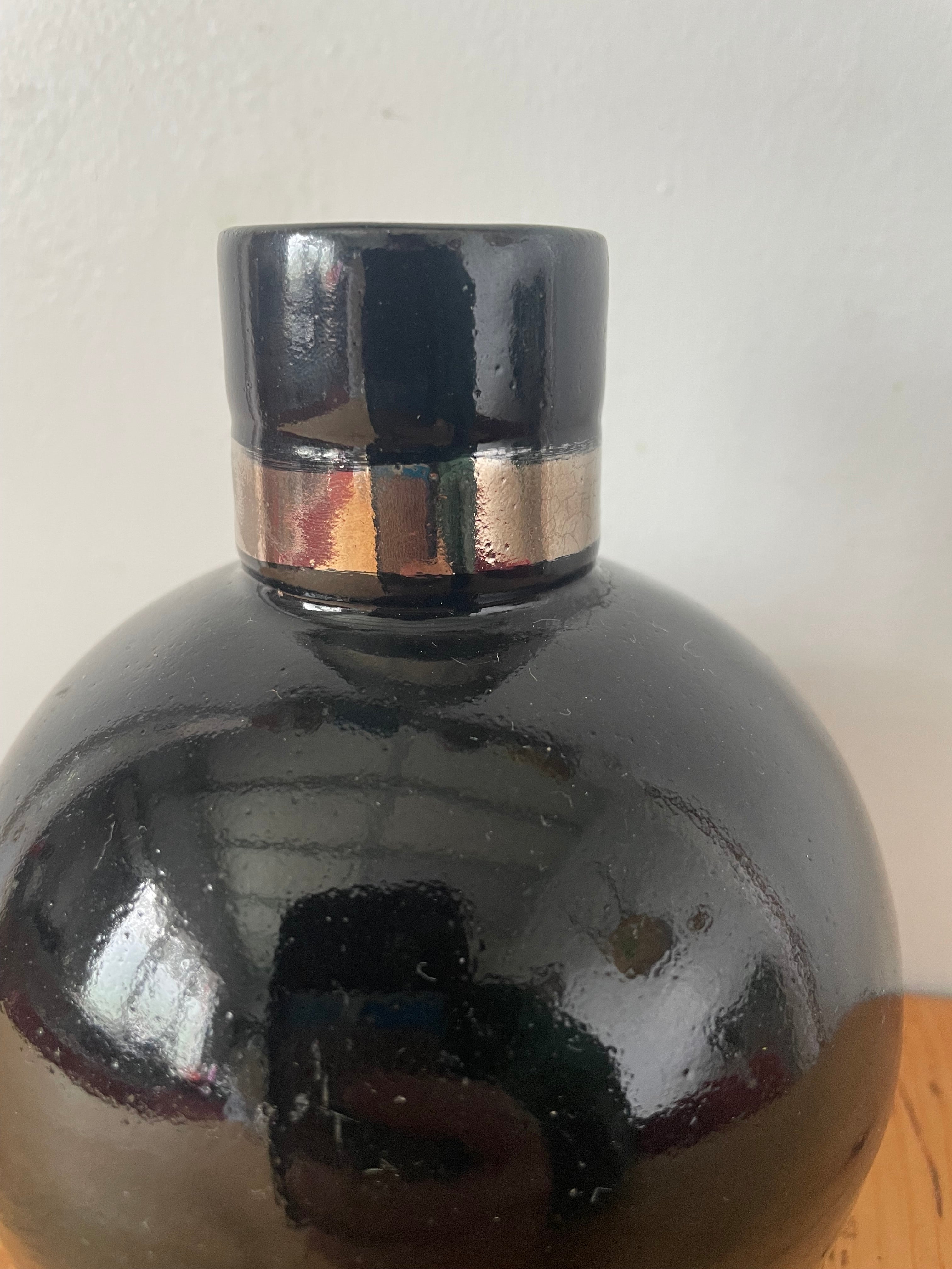 Black And Silver Pottery Vessel