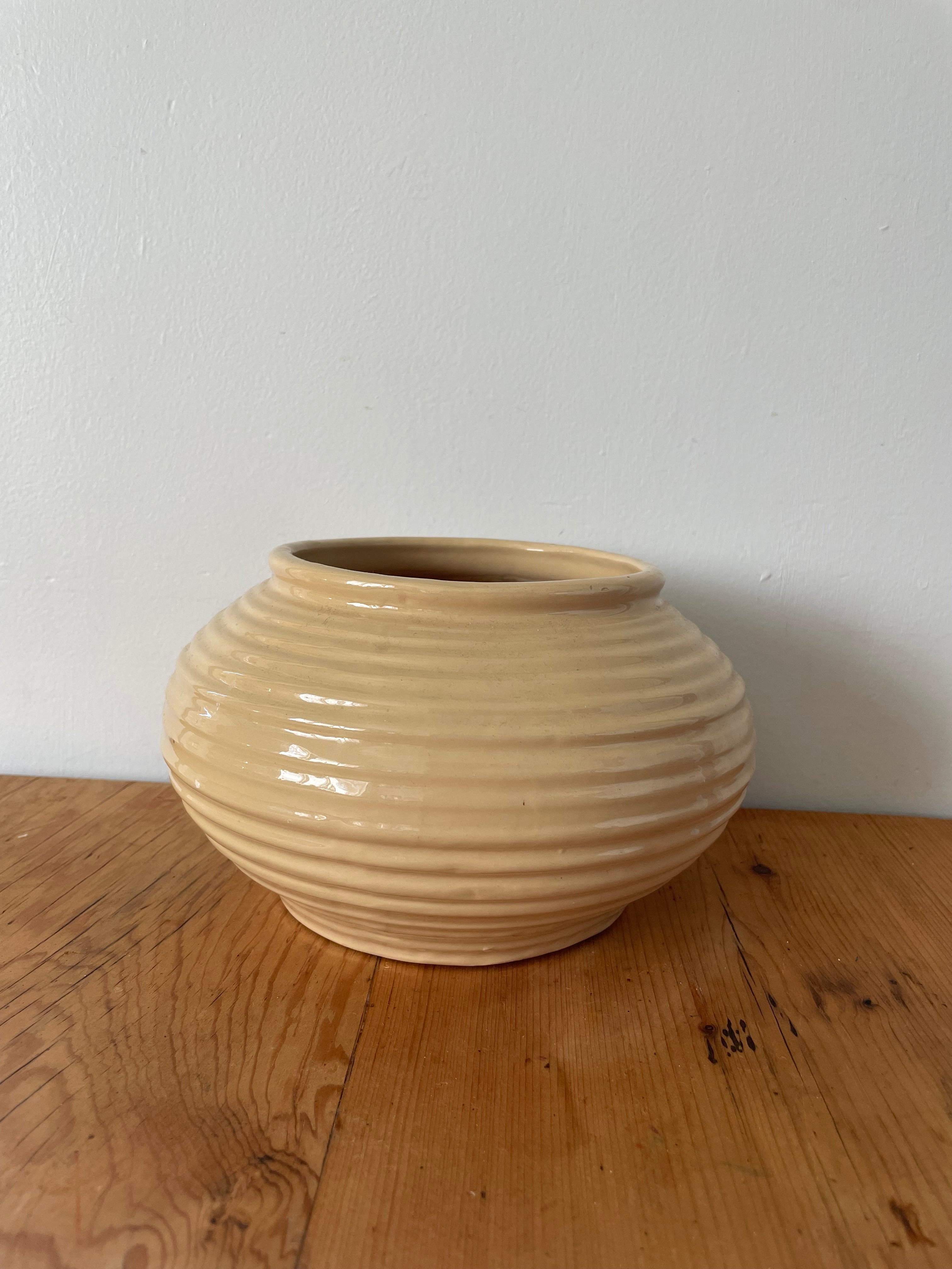 Ridged Cream Pottery Vessel