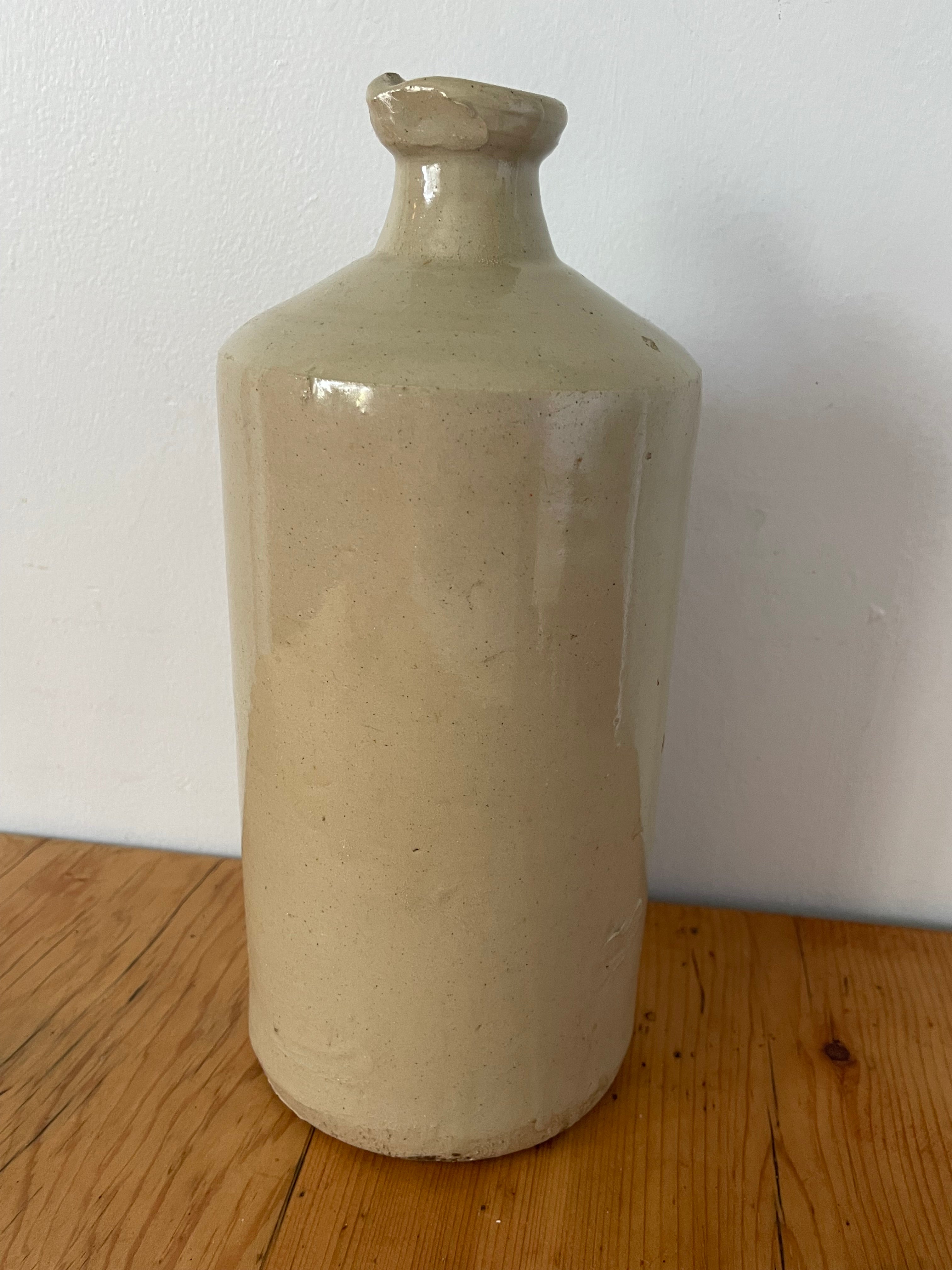 Antique Stoneware Lipped Bottle