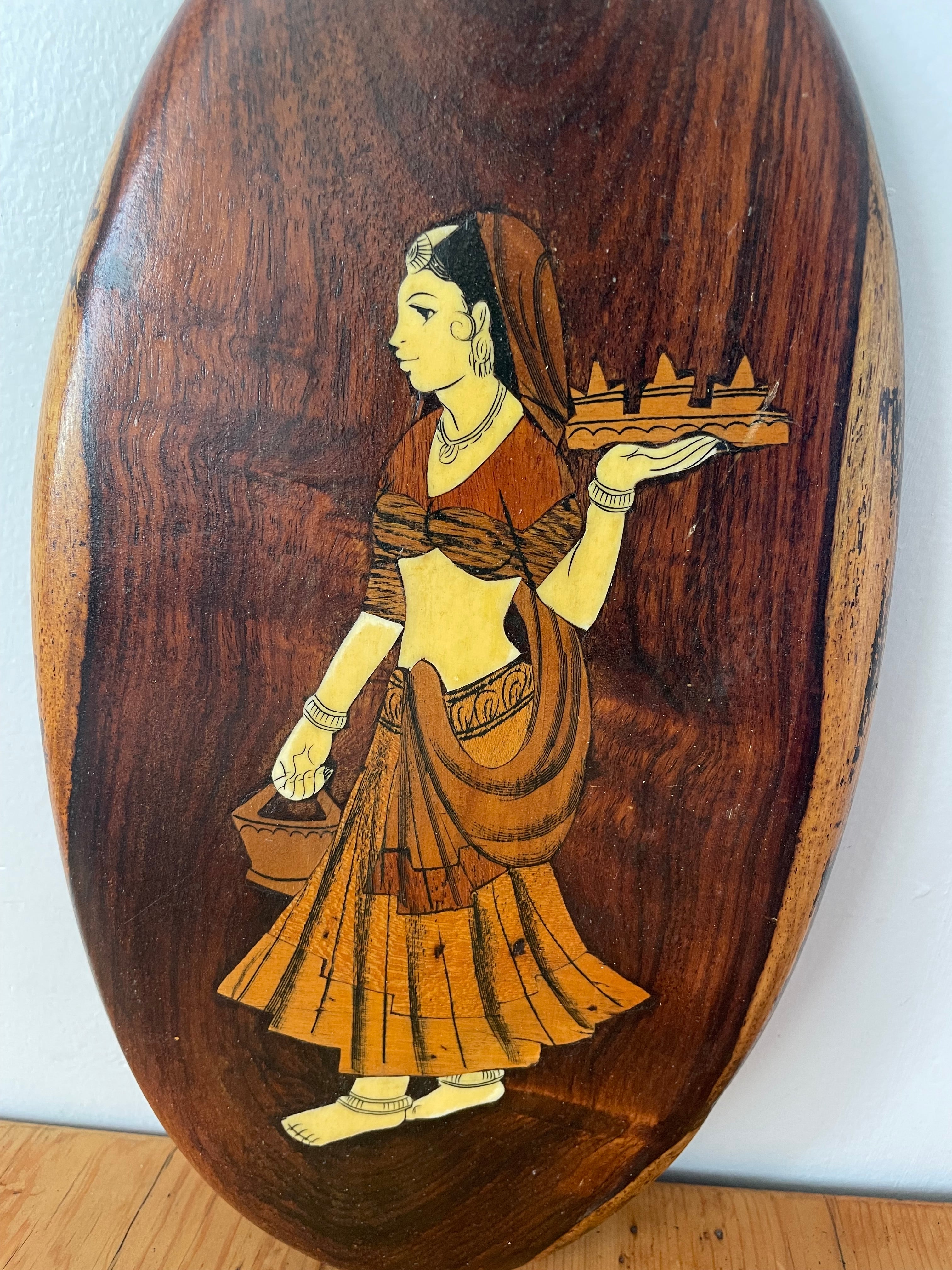 Wooden Plaque Of A Woman In A Sari