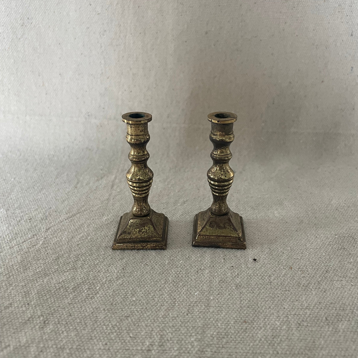 Circa 1960s Tiny Cast Brass Candle Holders